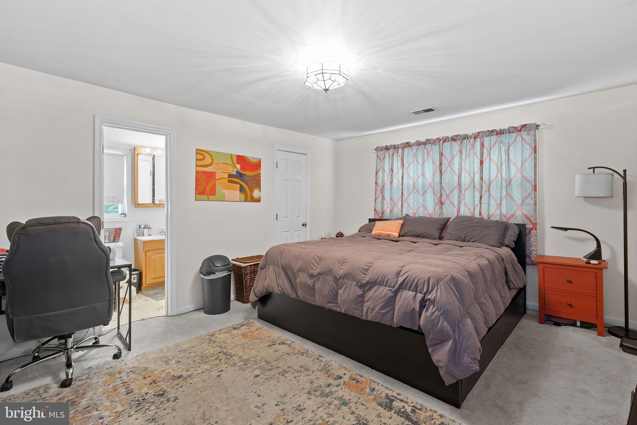 804 Telegraph Road Stafford, VA 22554 - Photo 28 of 39 a bedroom with a bed and wooden floor