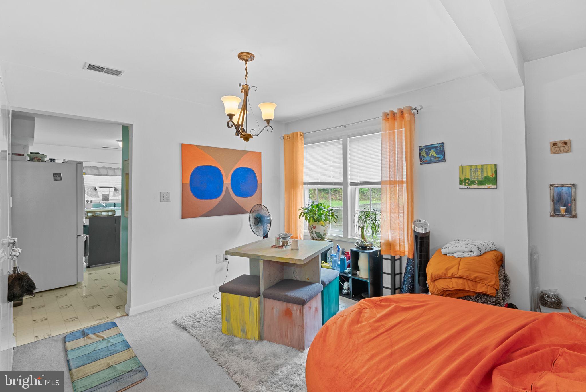 804 Telegraph Road Stafford, VA 22554 - Photo 34 of 39 a bedroom with a bed and wooden floor