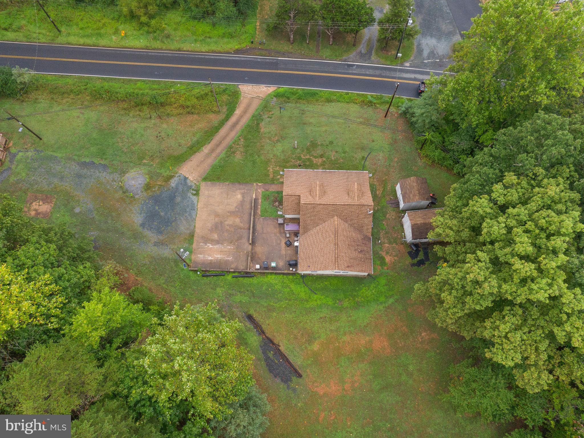 804 Telegraph Road Stafford, VA 22554 - Photo 9 of 39 a backyard of a house with lots of green space and fountain