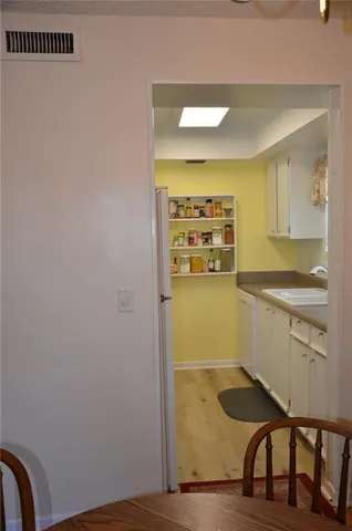 a view of storage and utility room with washer and dryer