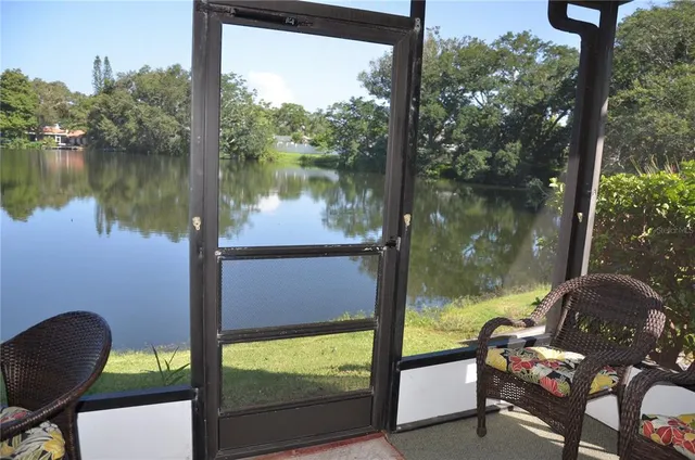a view of a lake from a balcony