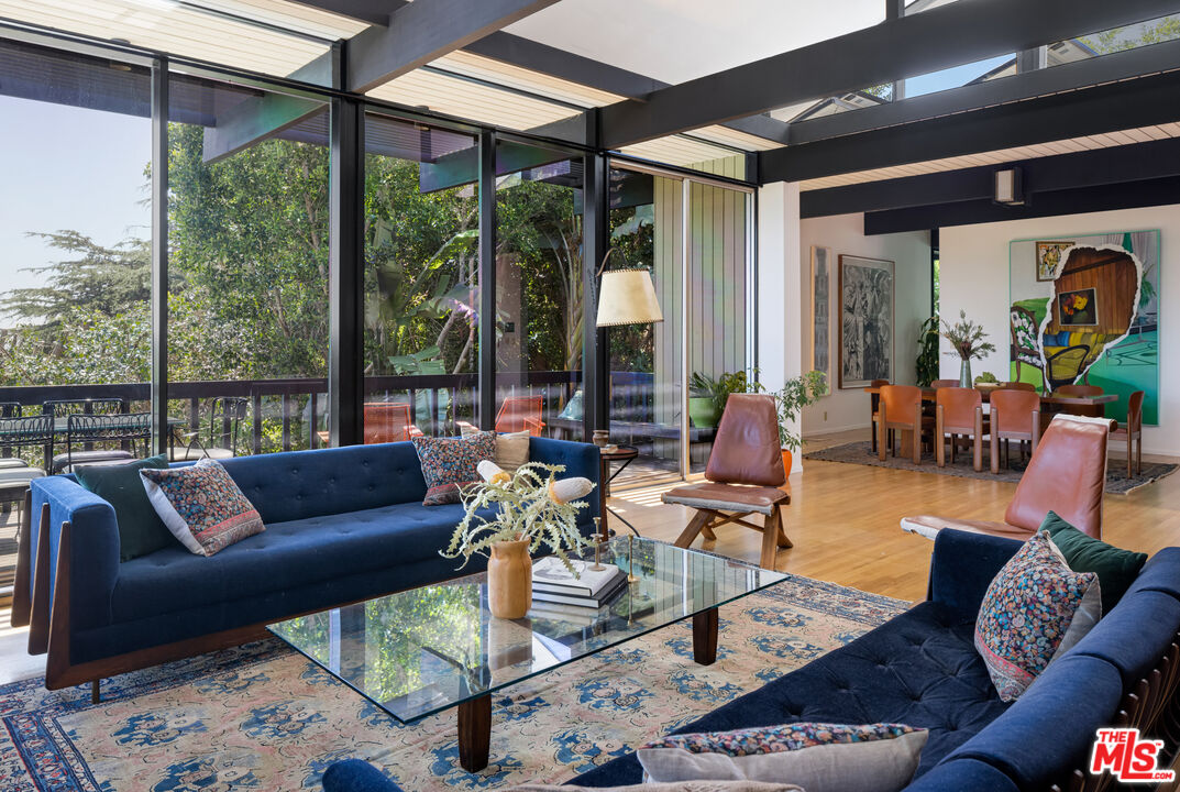 4520 Dundee Drive Los Angeles, CA 90027 - Photo 11 of 63 a living room with furniture and a large window