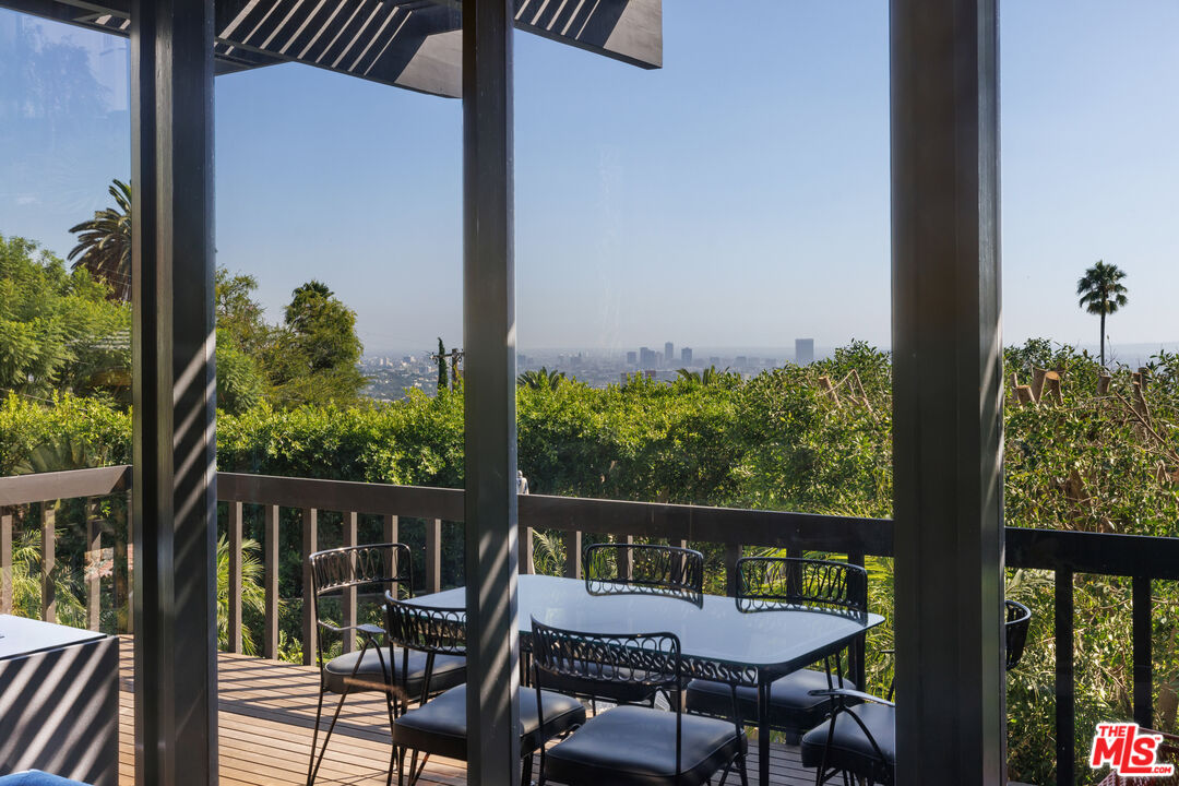 4520 Dundee Drive Los Angeles, CA 90027 - Photo 12 of 63 a view of a balcony with furniture