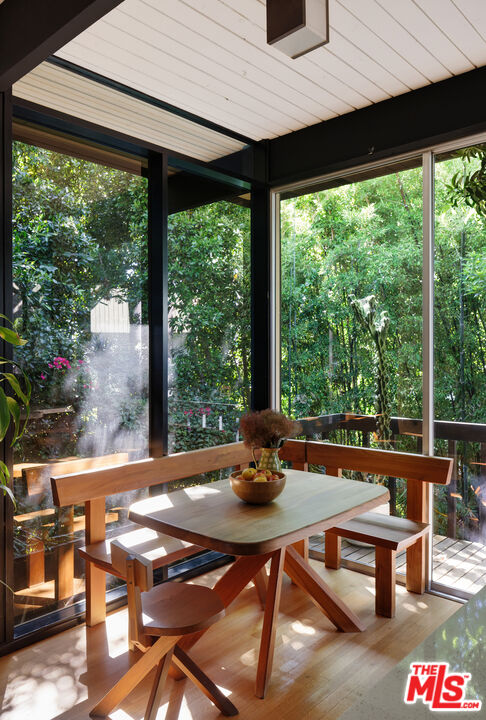 4520 Dundee Drive Los Angeles, CA 90027 - Photo 19 of 63 a room with furniture and a large window