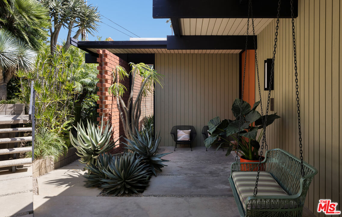 4520 Dundee Drive Los Angeles, CA 90027 - Photo 2 of 63 a view of front door and potted plants