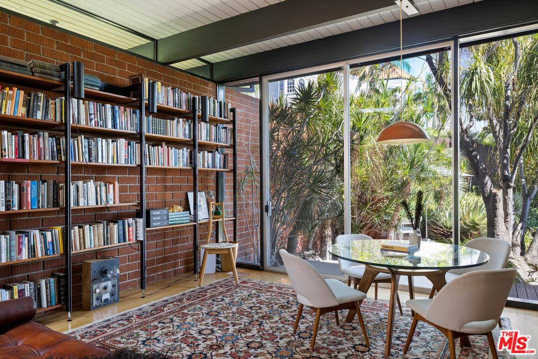 4520 Dundee Drive Los Angeles, CA 90027 - Photo 22 of 63 a view of a livingroom with furniture and staircase