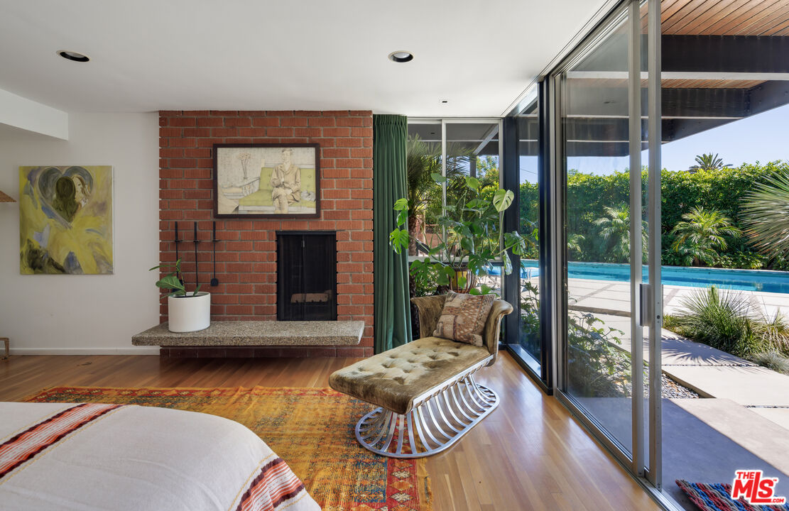 4520 Dundee Drive Los Angeles, CA 90027 - Photo 32 of 63 a balcony with table and chairs