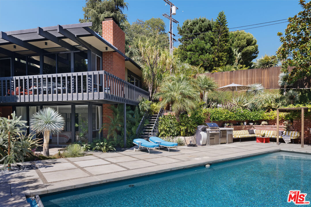 4520 Dundee Drive Los Angeles, CA 90027 - Photo 38 of 63 a view of a house with sitting area and garden