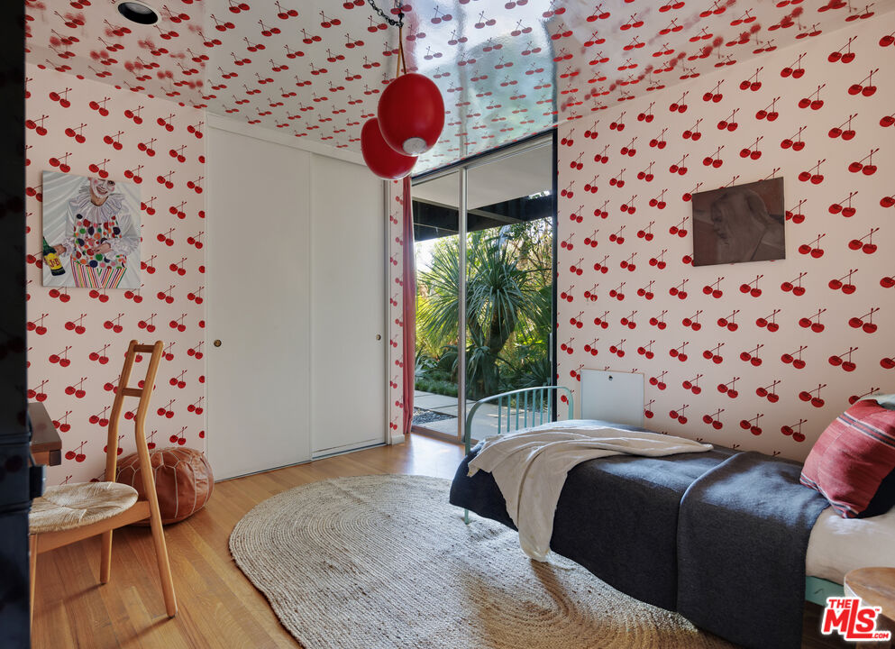 4520 Dundee Drive Los Angeles, CA 90027 - Photo 42 of 63 a bedroom with a bed and a window