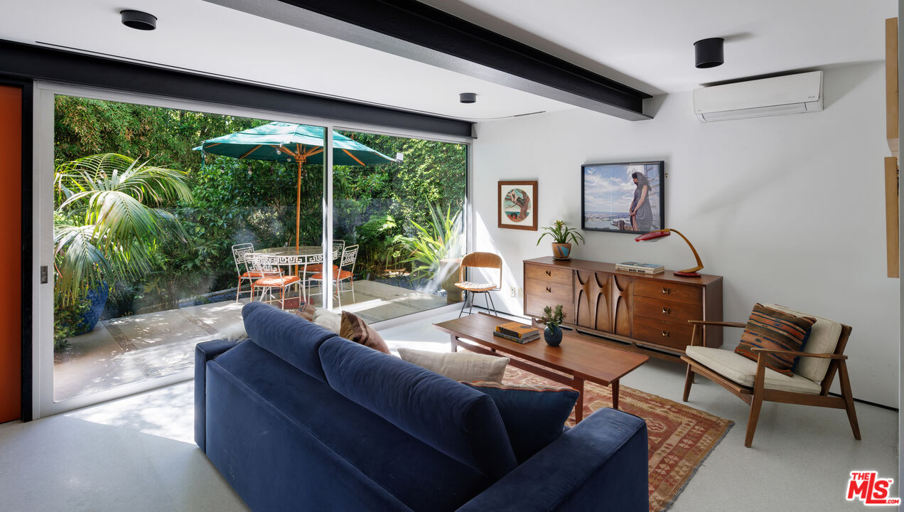 4520 Dundee Drive Los Angeles, CA 90027 - Photo 47 of 63 a living room with furniture and a large window