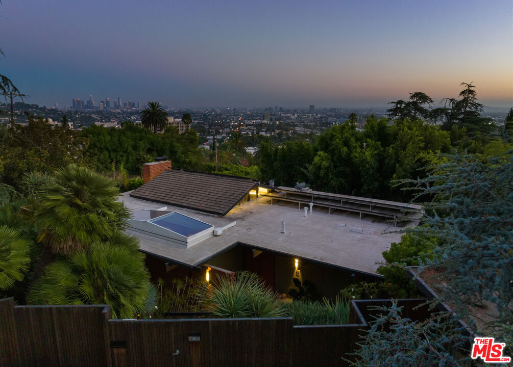4520 Dundee Drive Los Angeles, CA 90027 - Photo 55 of 63 an aerial view of a house with a yard and lake view in back