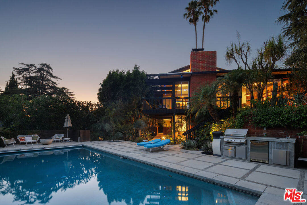 4520 Dundee Drive Los Angeles, CA 90027 - Photo 60 of 63 a view of a house with pool and a yard