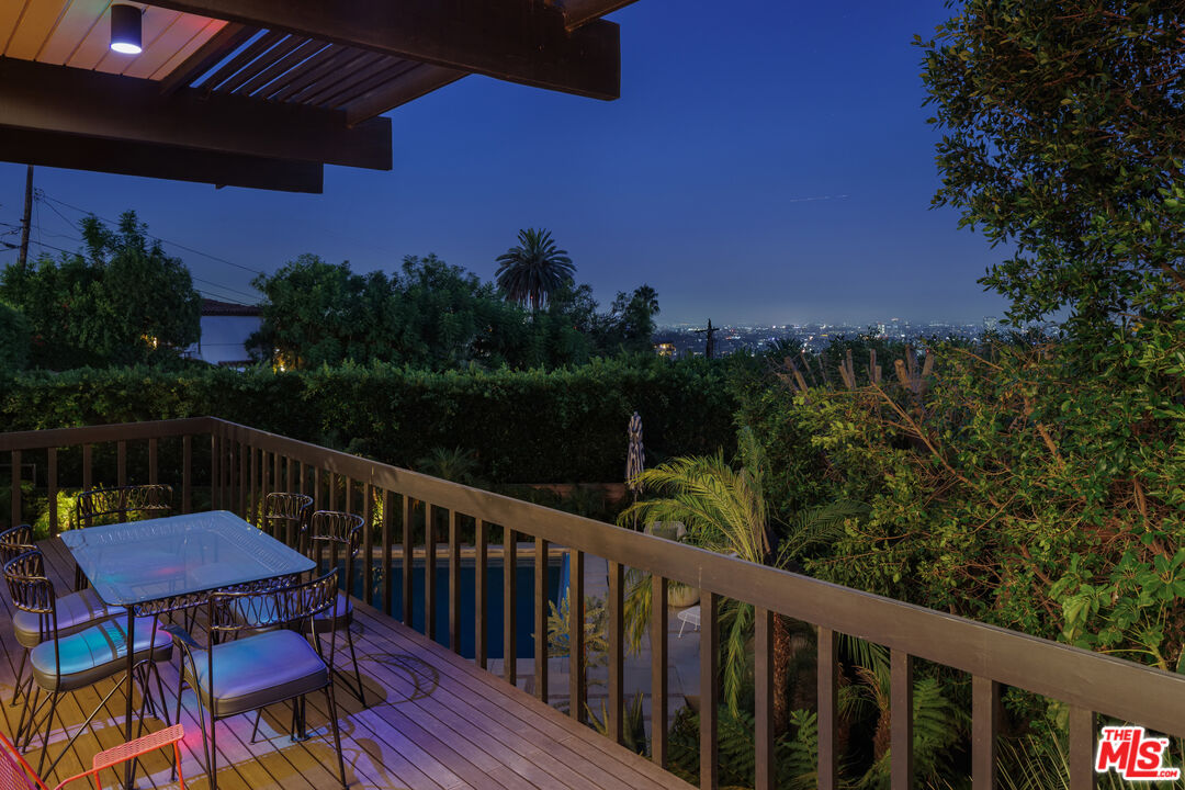 4520 Dundee Drive Los Angeles, CA 90027 - Photo 62 of 63 a view of a balcony with chairs