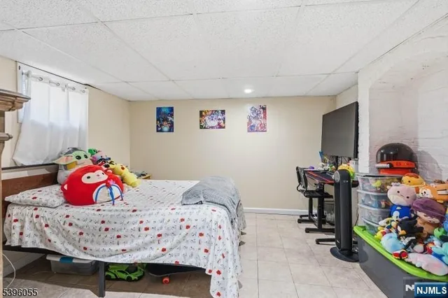 a bedroom with a bed and a walk in closet