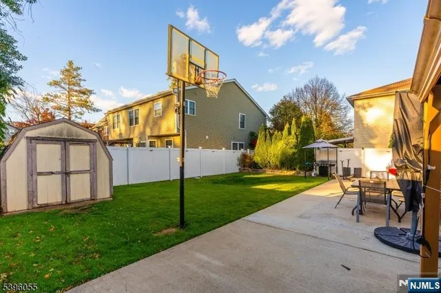 a view of swimming pool with a balcony