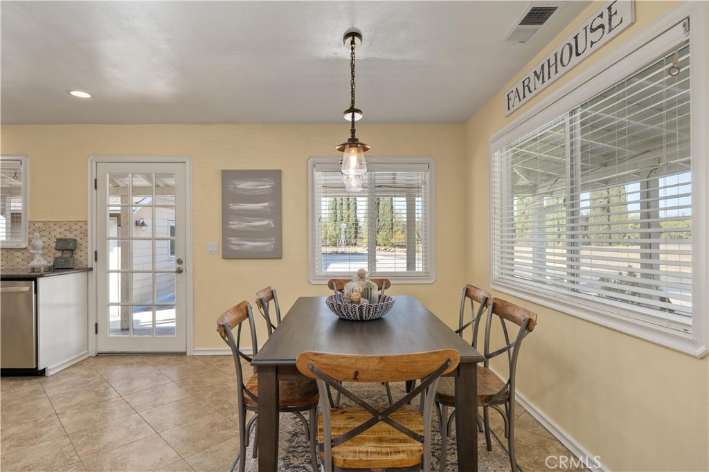 8683 Sullivan Way Durham, CA 95938 - Photo 13 of 32 a dining room with furniture and window