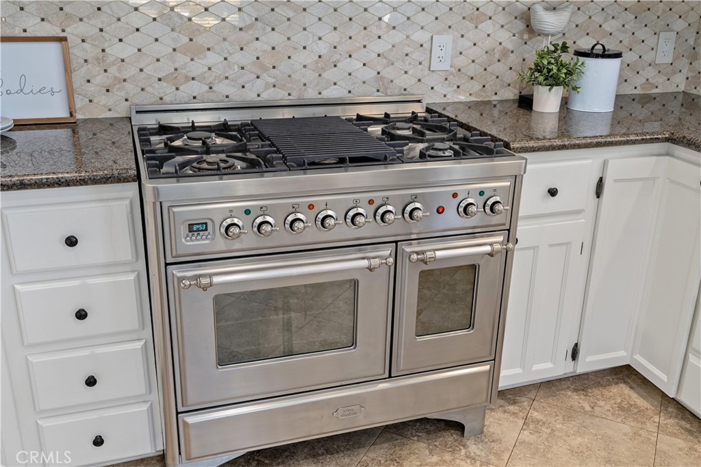 8683 Sullivan Way Durham, CA 95938 - Photo 17 of 32 a close stove top oven sitting inside of a kitchen
