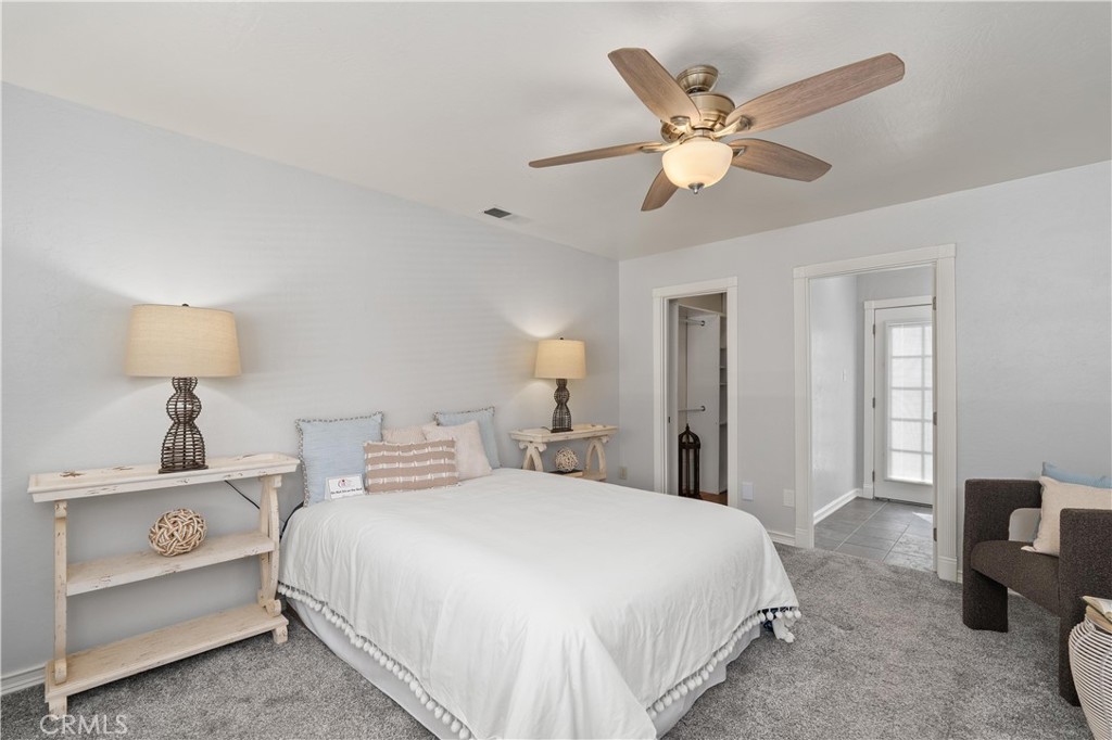 8683 Sullivan Way Durham, CA 95938 - Photo 19 of 32 a bedroom with a bed and window