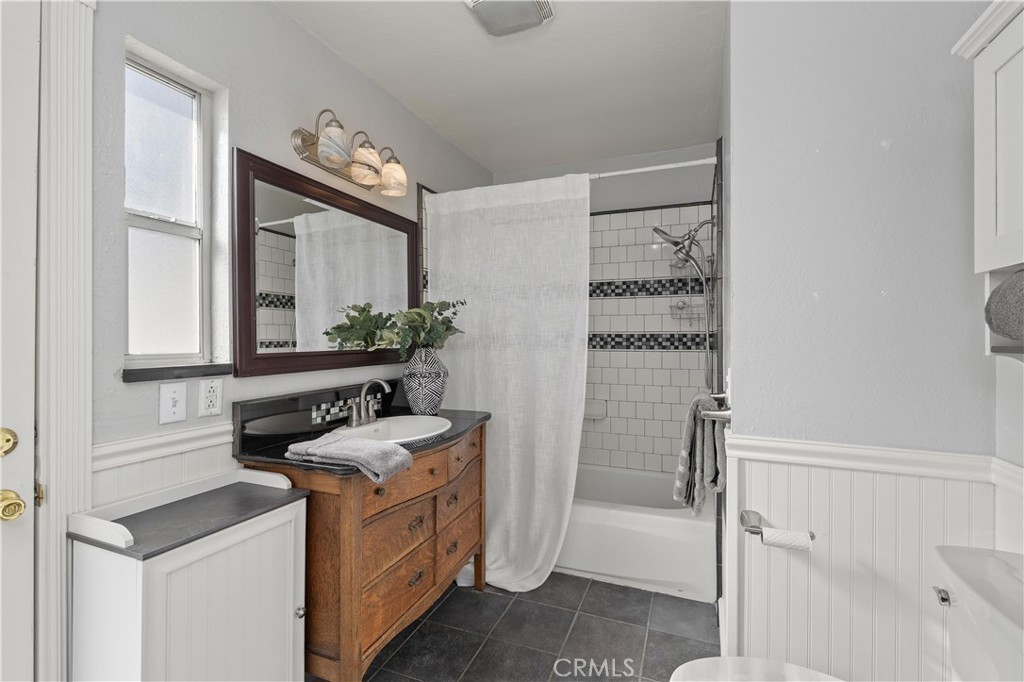 8683 Sullivan Way Durham, CA 95938 - Photo 20 of 32 a bathroom with a sink a vanity and a mirror