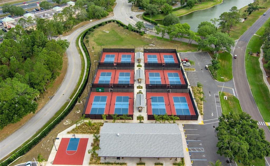 6409 Wedgewood Drive Spring Hill, FL 34606 - Photo 35 of 38 an aerial view of a multi story residential apartment building