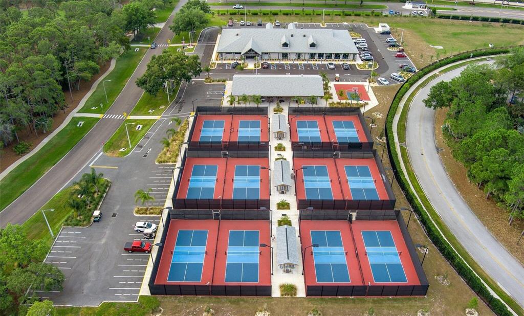 6409 Wedgewood Drive Spring Hill, FL 34606 - Photo 4 of 38 an aerial view of a multi story residential apartment building