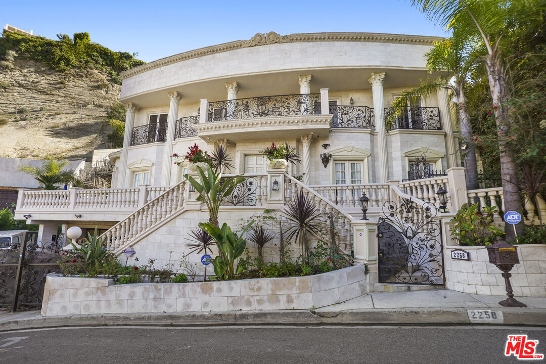front view of a house with a street