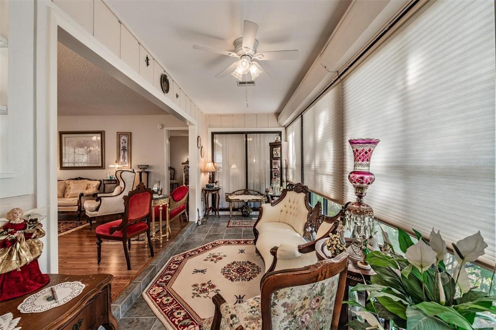 9302 Trowbridge Court New Port Richey, FL 34655 - Photo 12 of 41 a living room with furniture and wooden floor
