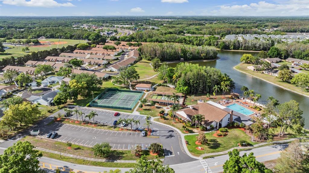 9302 Trowbridge Court New Port Richey, FL 34655 - Photo 39 of 41 an aerial view of residential houses with outdoor space