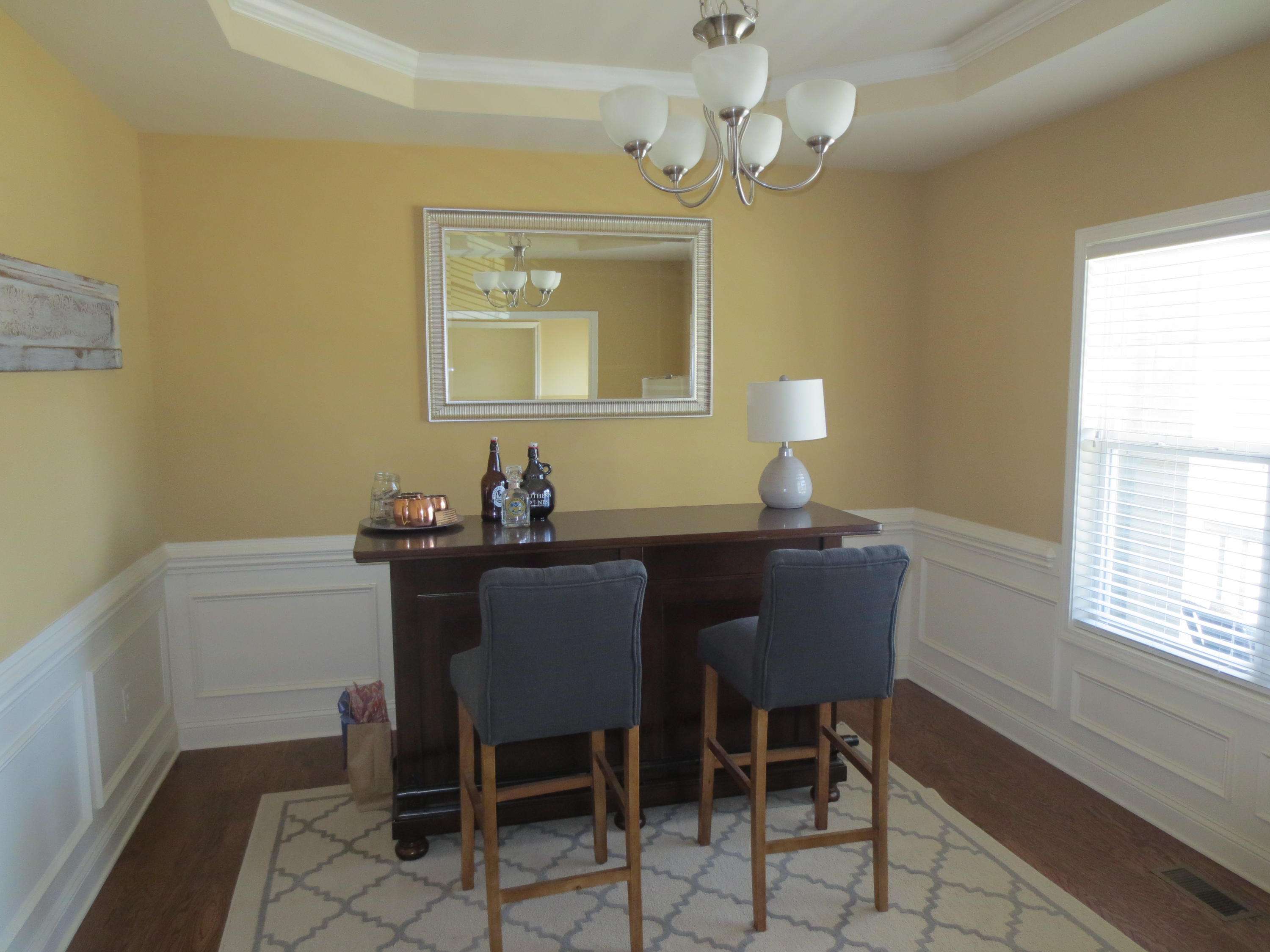 110 Queens Cove Way Whispering Pines, NC 28327 - Photo 11 of 24 Formal dining room with trey ceiling and wainscoting