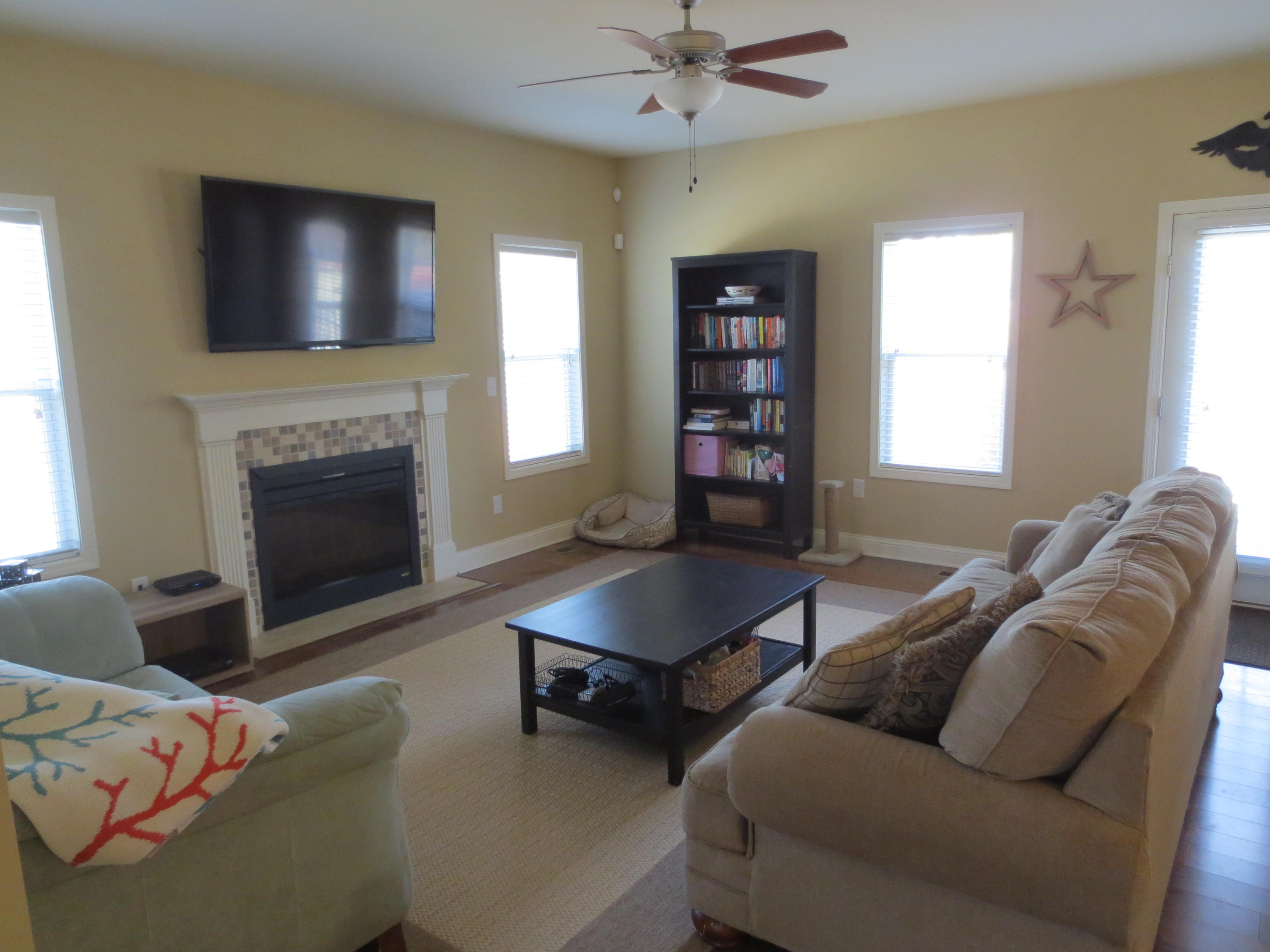 110 Queens Cove Way Whispering Pines, NC 28327 - Photo 7 of 24 Open living room