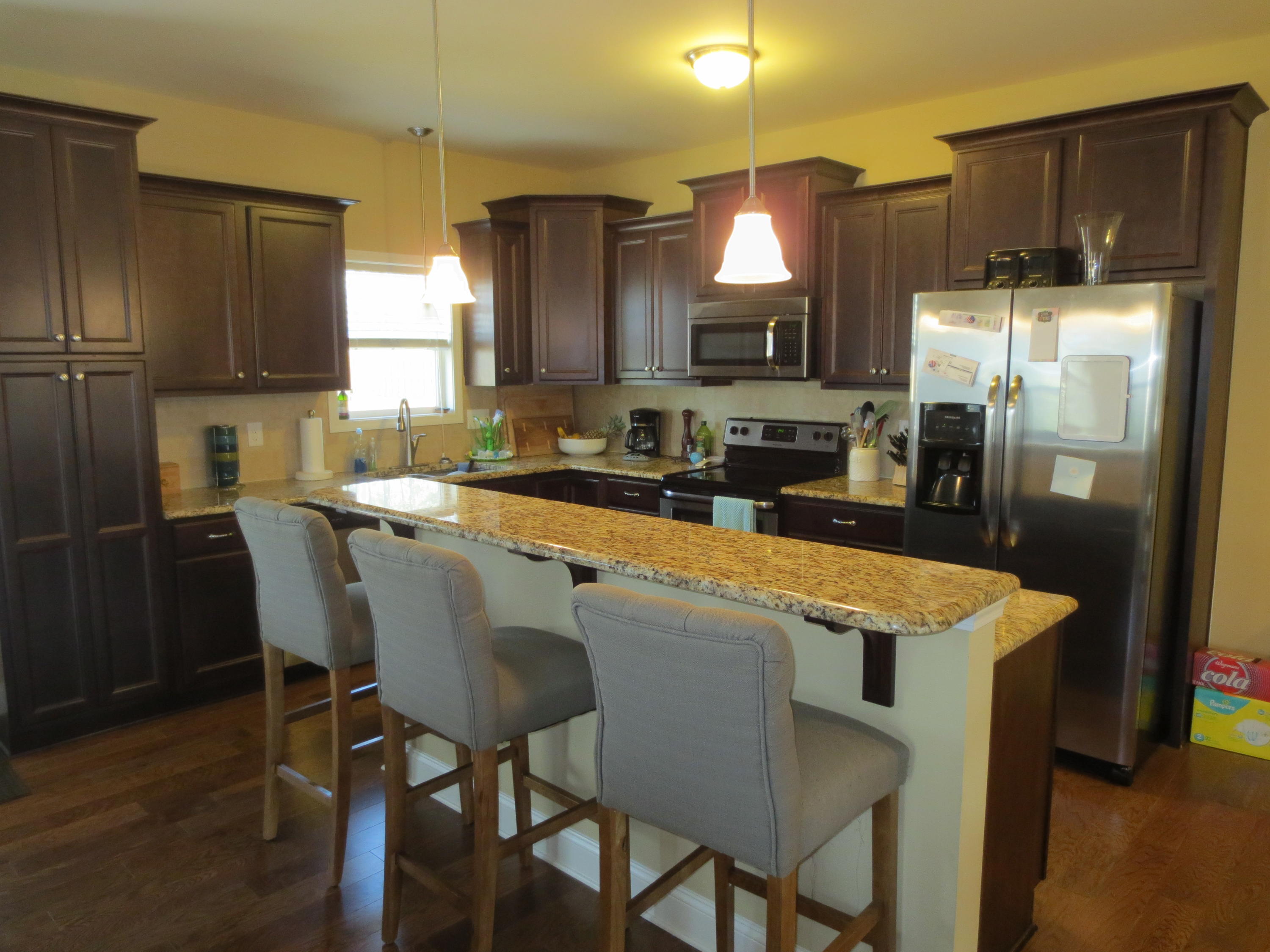 110 Queens Cove Way Whispering Pines, NC 28327 - Photo 8 of 24 Wow Kitchen! upgraded cabinets, granite, and stainless appliances.