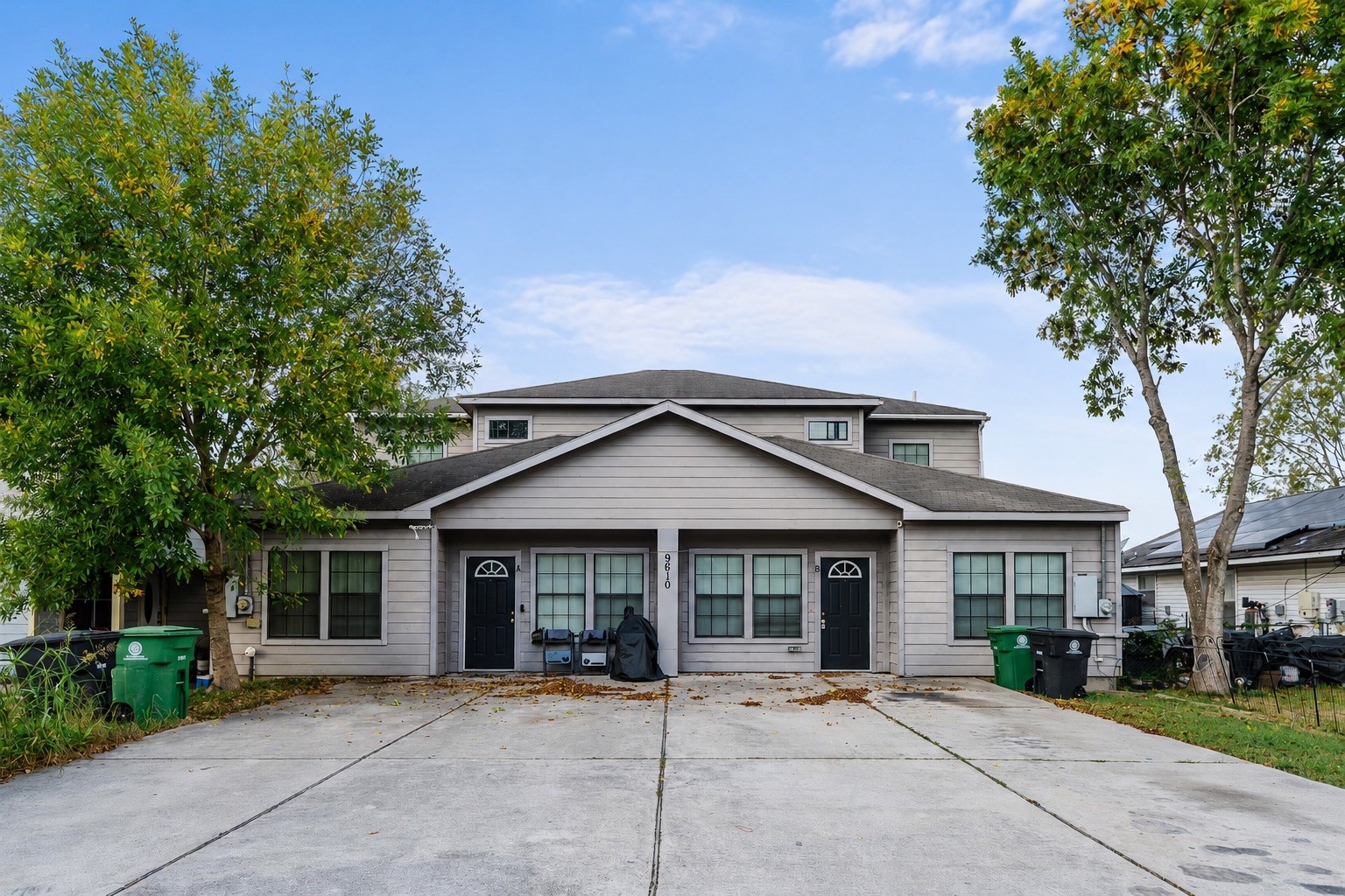 9610 Buffum Street, Unit B Houston, TX 77051 - Photo 3 of 25 a front view of a house with a garden