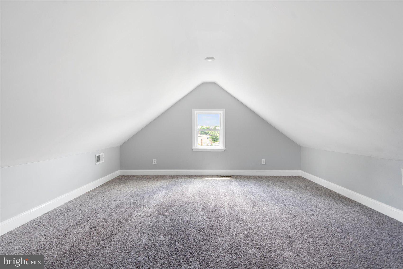 6628 Hartwait Street Baltimore, MD 21224 - Photo 17 of 31 an empty room with a empty space and windows