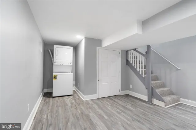 a view of entryway with wooden floor