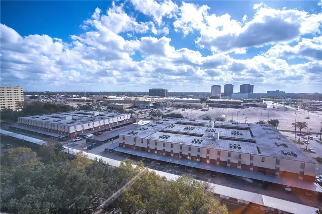 a view of a building with a tree