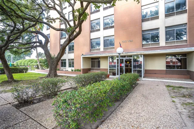 a view of a backyard with a garden