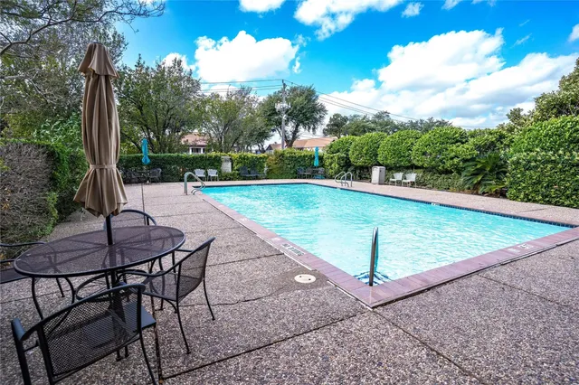 a view of street with parked cars