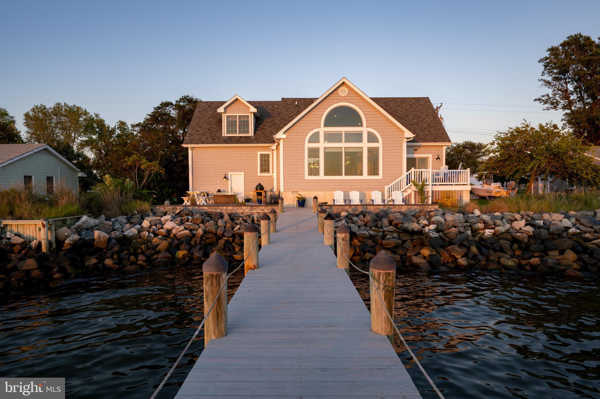 10482 Cassandra Drive Chance, MD 21821 - Photo 22 of 91 a view of a house with many windows