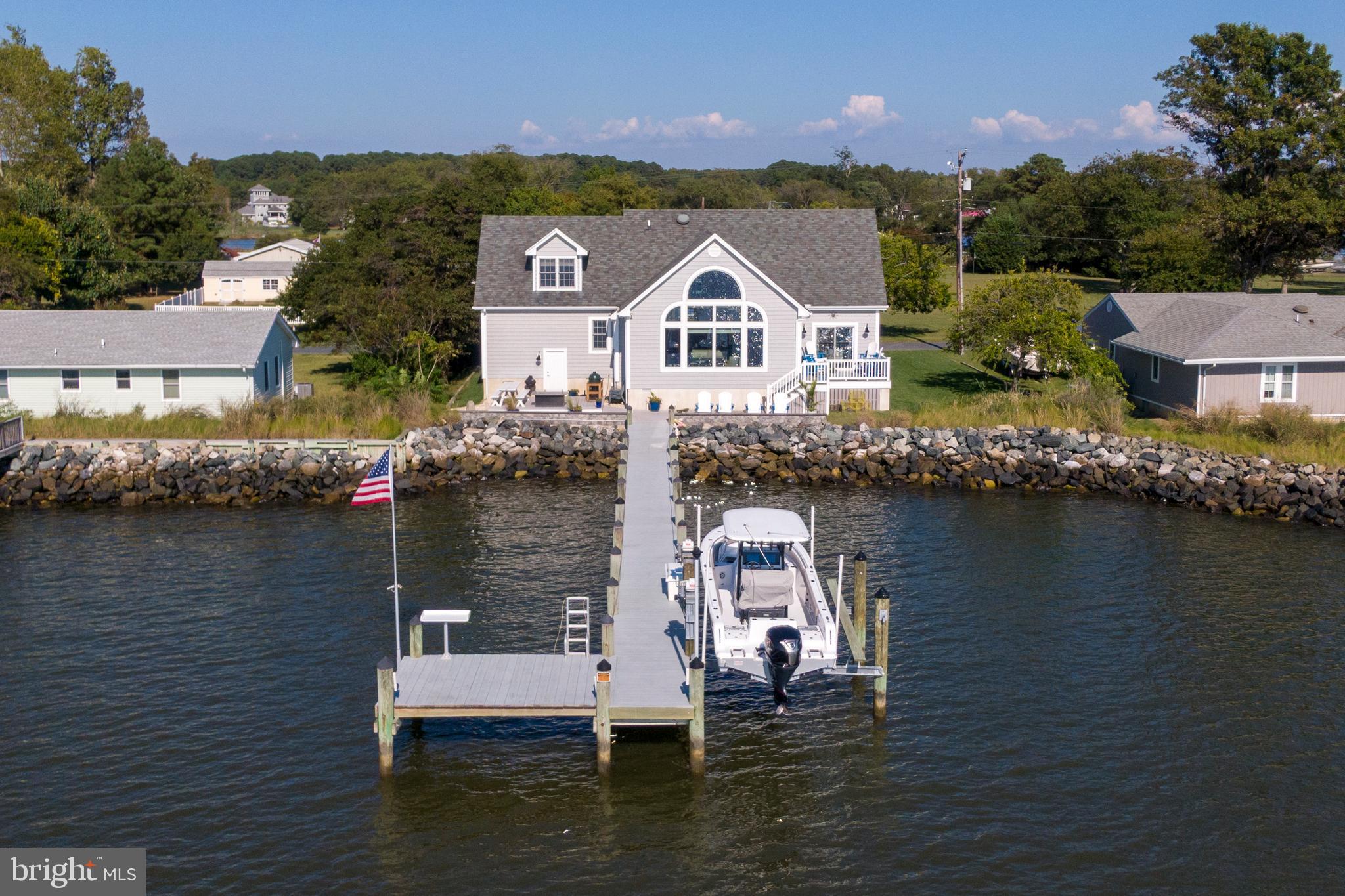10482 Cassandra Drive Chance, MD 21821 - Photo 25 of 91 a aerial view of a house with a lake view