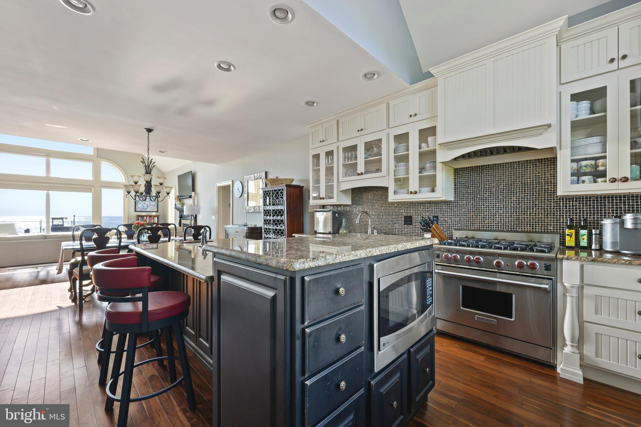 10482 Cassandra Drive Chance, MD 21821 - Photo 48 of 91 a kitchen with stainless steel appliances granite countertop a stove and cabinets