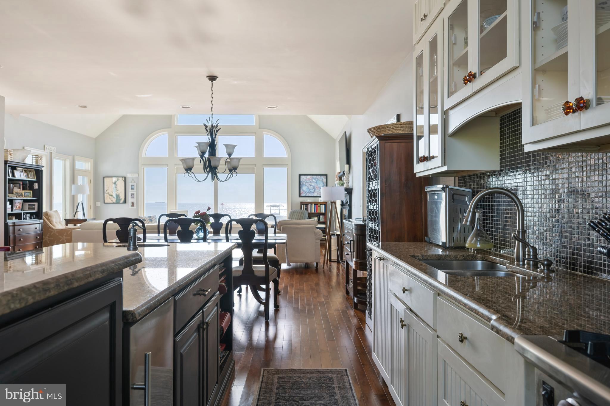10482 Cassandra Drive Chance, MD 21821 - Photo 50 of 91 a kitchen with lots of counter top space a sink appliances and cabinets