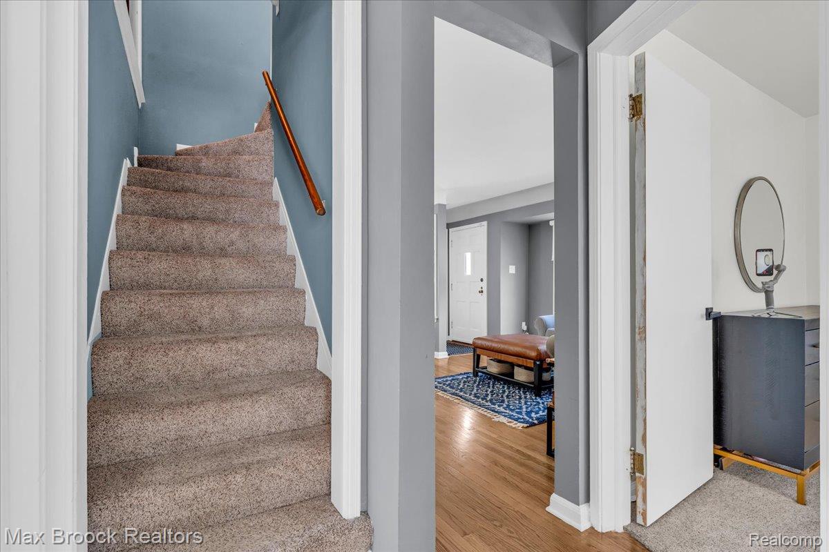 3711 Normandy Road Royal Oak, MI 48073 - Photo 19 of 40 Stairway featuring wood finished floors and baseboards