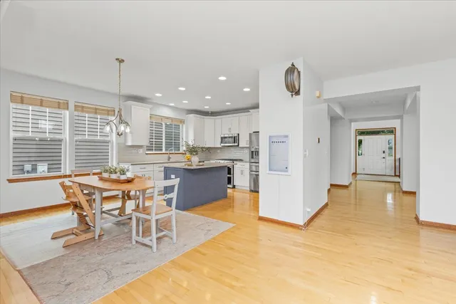 a view of a dining room with furniture window and outside view