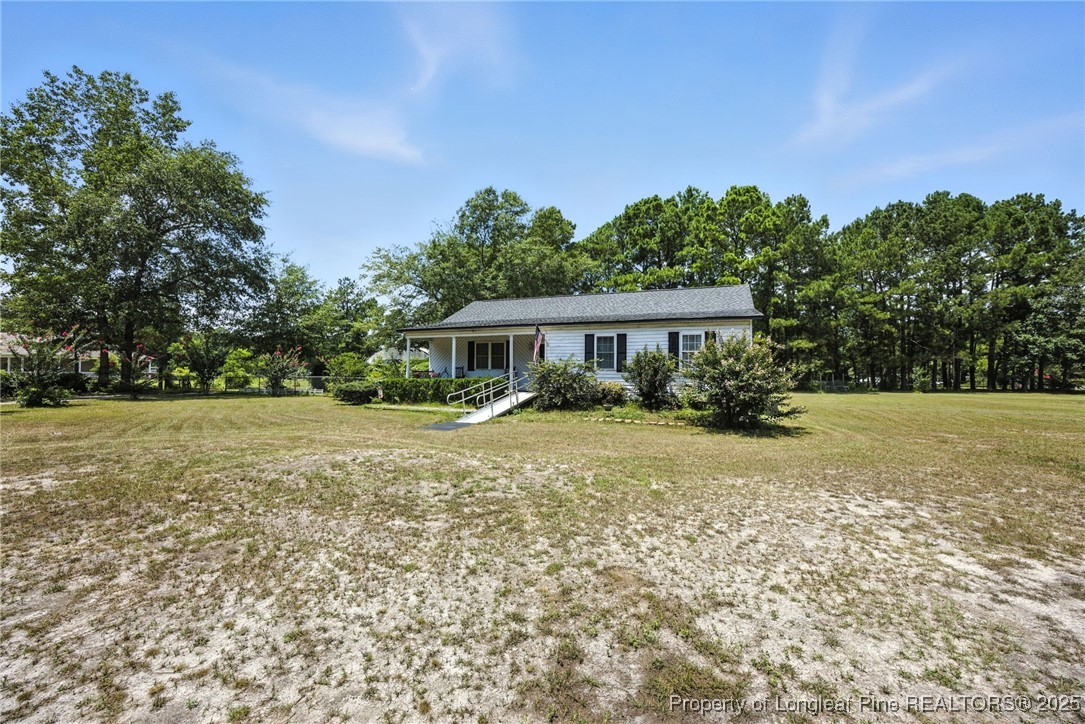 223 Broadwell Road St. Pauls, NC 28384 - Photo 2 of 28 a front view of house with yard and green space