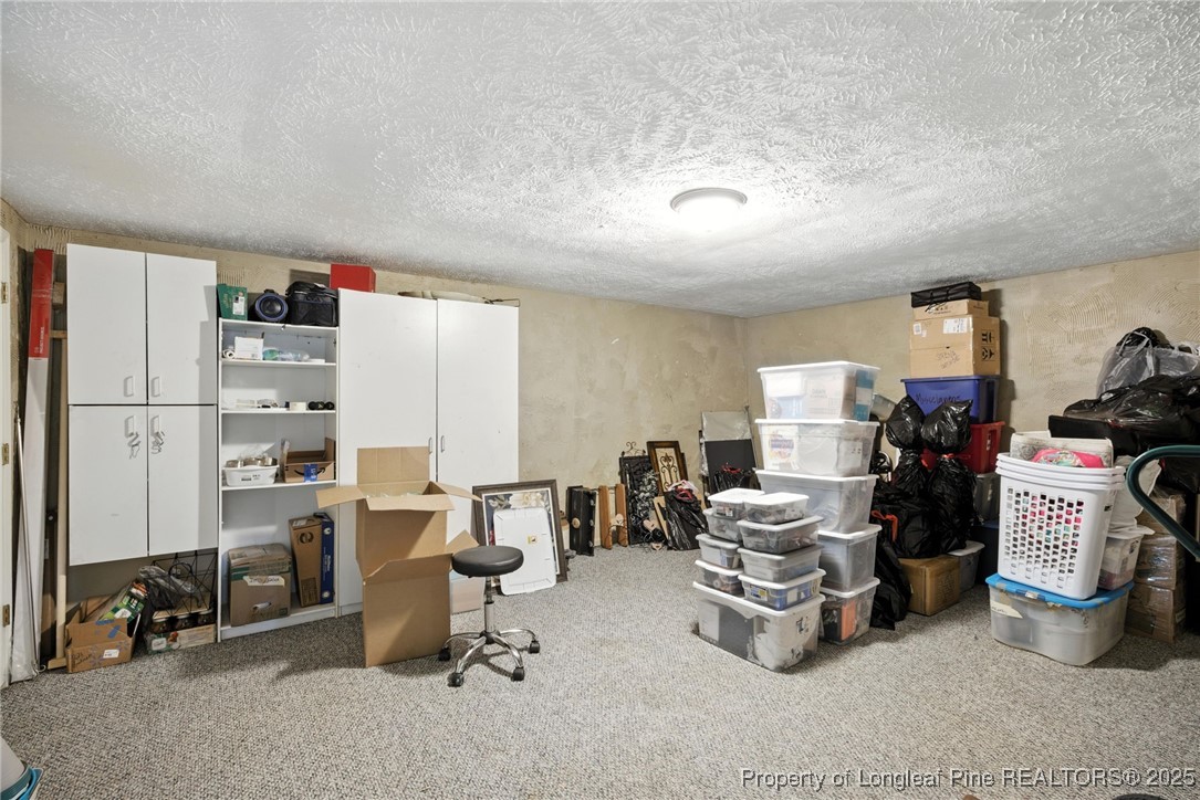 223 Broadwell Road St. Pauls, NC 28384 - Photo 21 of 28 a room with furniture a air conditioner vent and a window