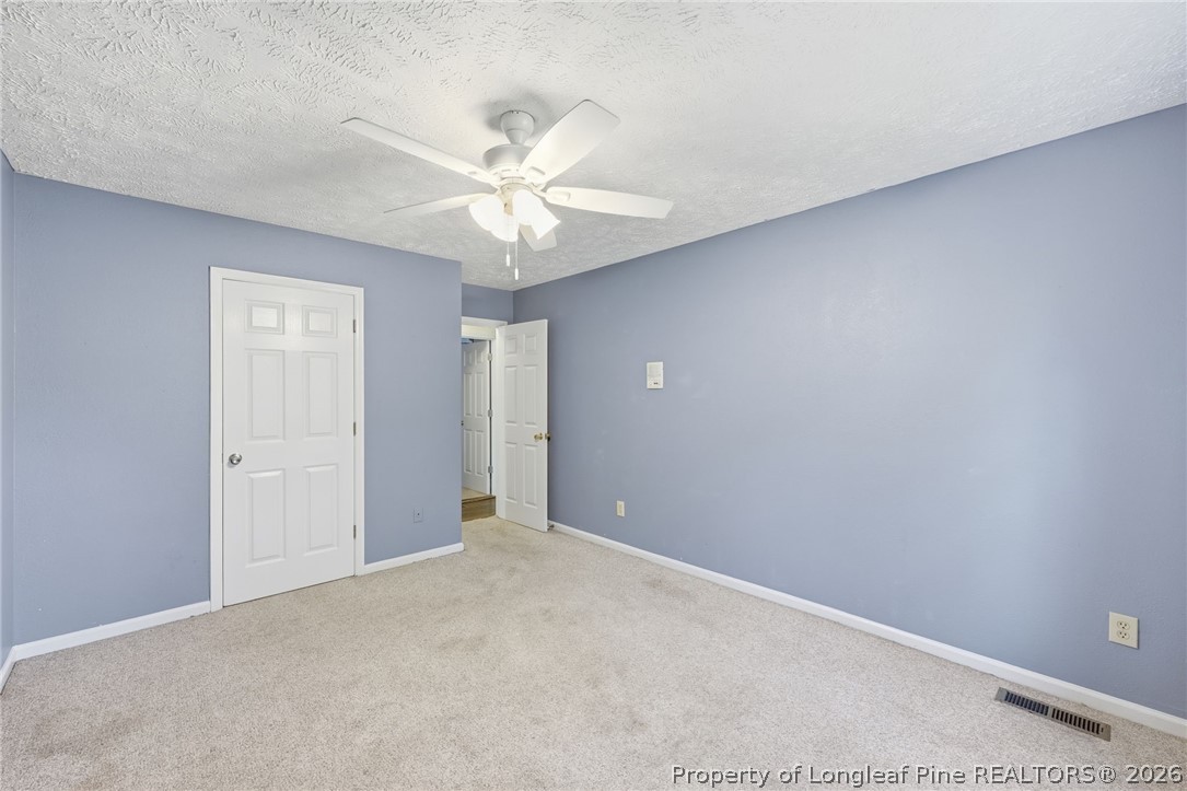 223 Broadwell Road St. Pauls, NC 28384 - Photo 22 of 28 a view of an empty room with a window