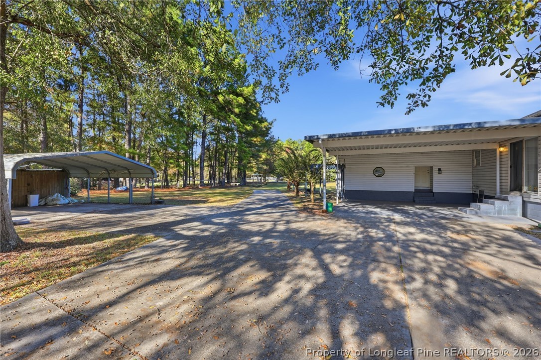 223 Broadwell Road St. Pauls, NC 28384 - Photo 24 of 28 a view of street with parked cars