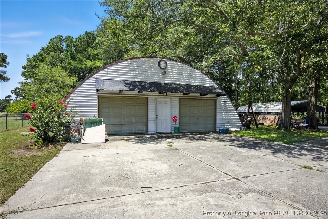 223 Broadwell Road St. Pauls, NC 28384 - Photo 25 of 28 a house view with a outdoor space