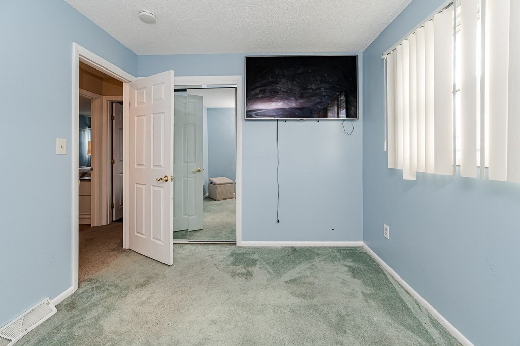 2 Lorenzo Road Lawrence, MA 01843 - Photo 20 of 42 an empty room with windows and closet