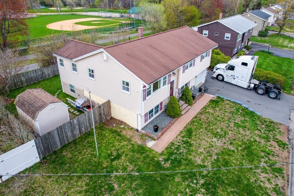 2 Lorenzo Road Lawrence, MA 01843 - Photo 2 of 42 an aerial view of a house with garden space and street view